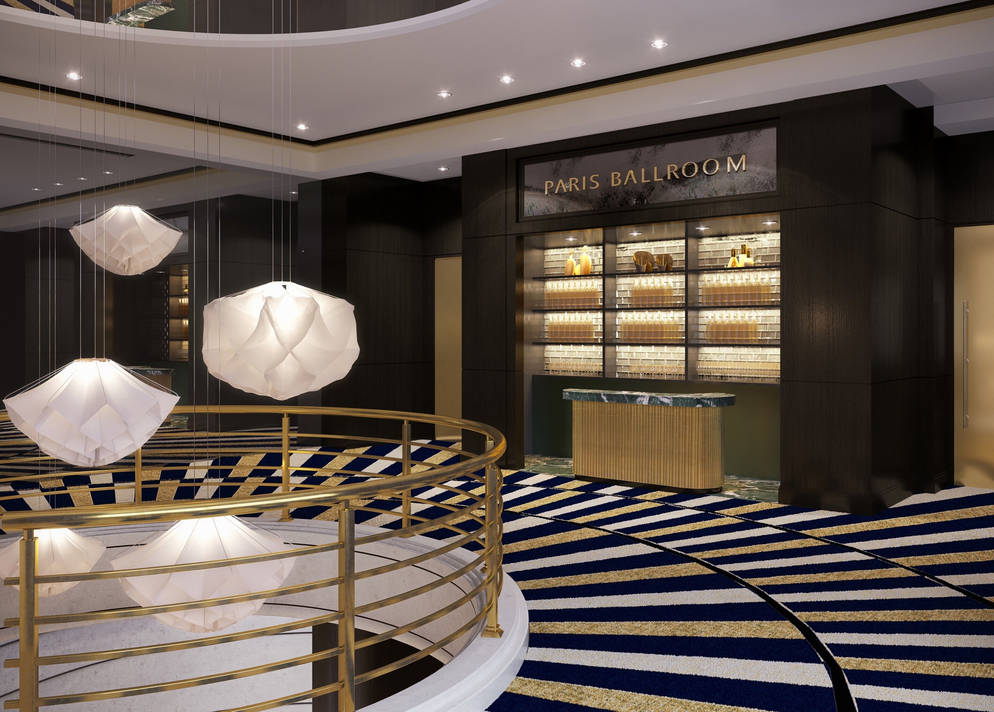 Un interior moderno con una barandilla circular, lámparas geométricas colgantes y una vitrina con la leyenda 'PARIS BALLROOM'.