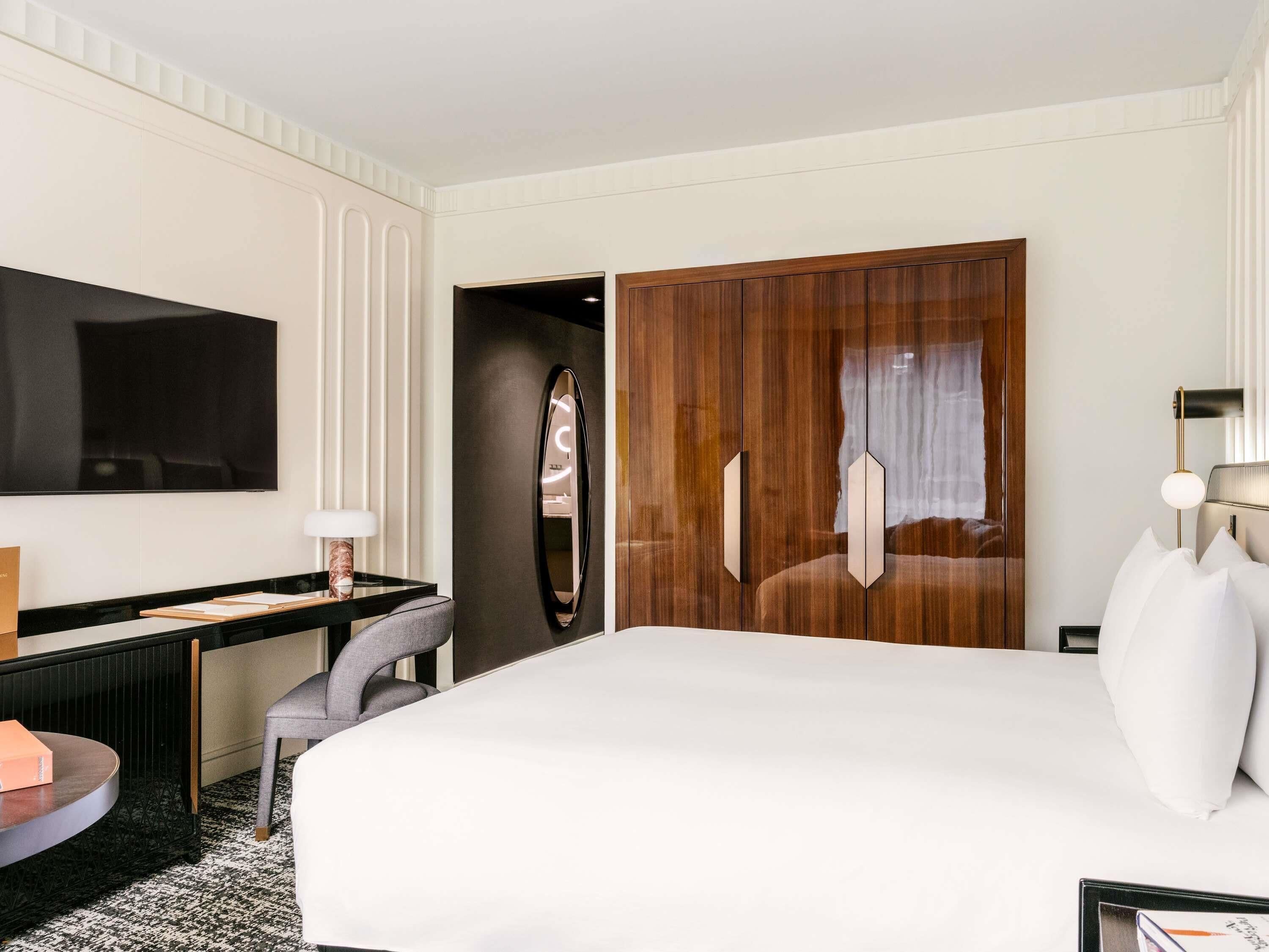 Premium bedding, down comforters, pillowtop beds, minibar