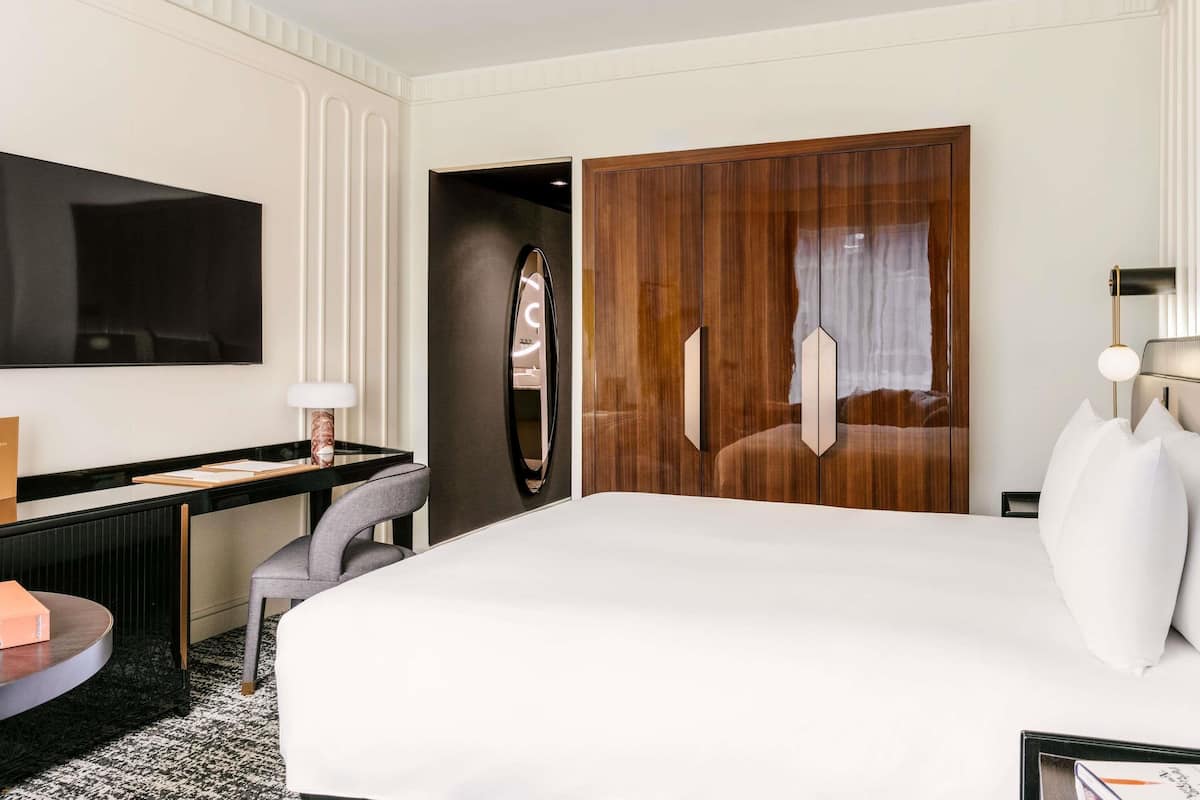 Premium bedding, down comforters, pillowtop beds, minibar