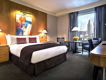 Premium bedding, down comforters, pillowtop beds, in-room safe at Sofitel New York
