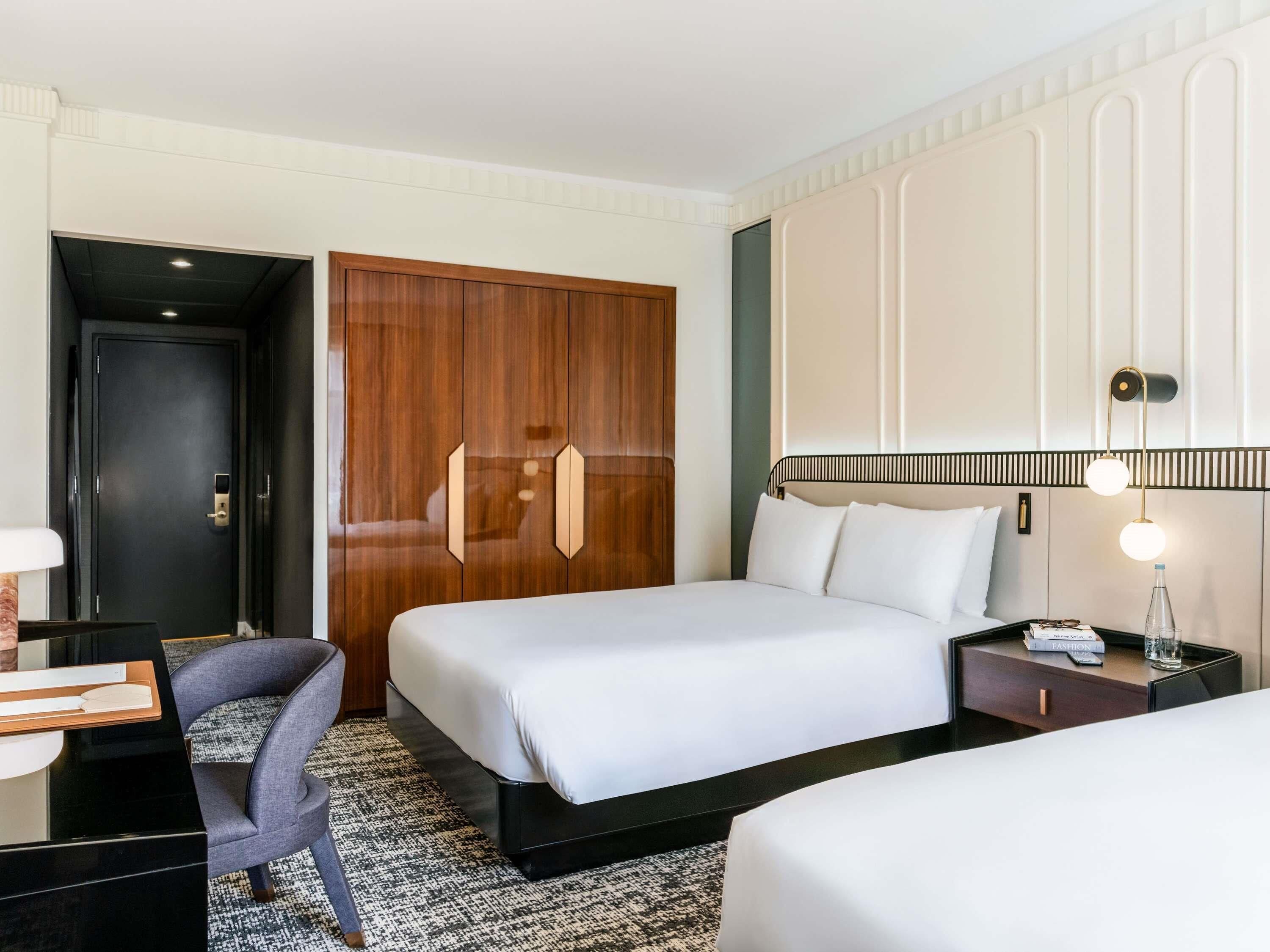 Premium bedding, down comforters, pillowtop beds, minibar