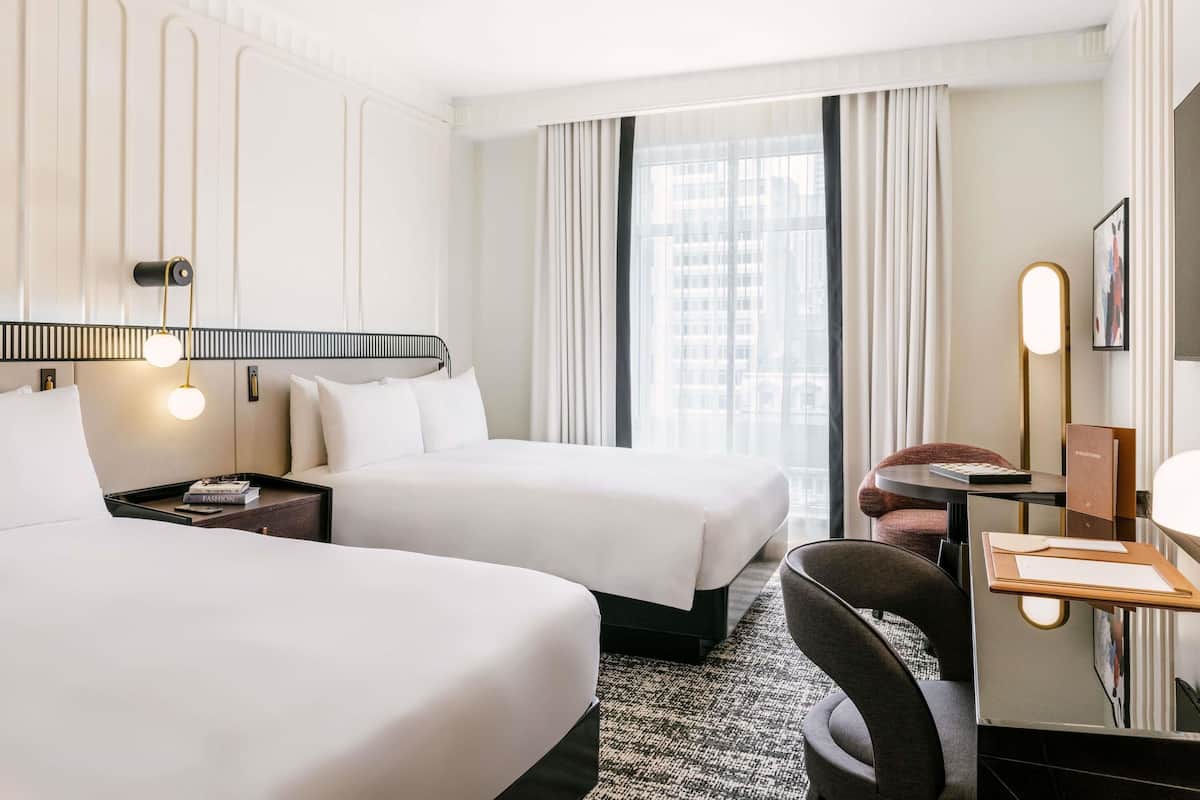 Premium bedding, down comforters, pillowtop beds, minibar