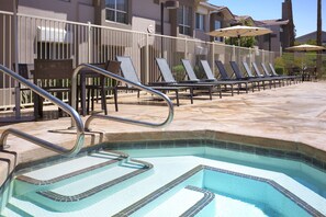 Outdoor pool, open 8:00 AM to 10:00 PM, sun loungers