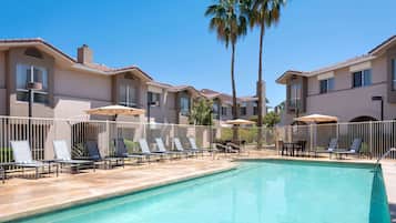Outdoor pool, open 8:00 AM to 10:00 PM, sun loungers