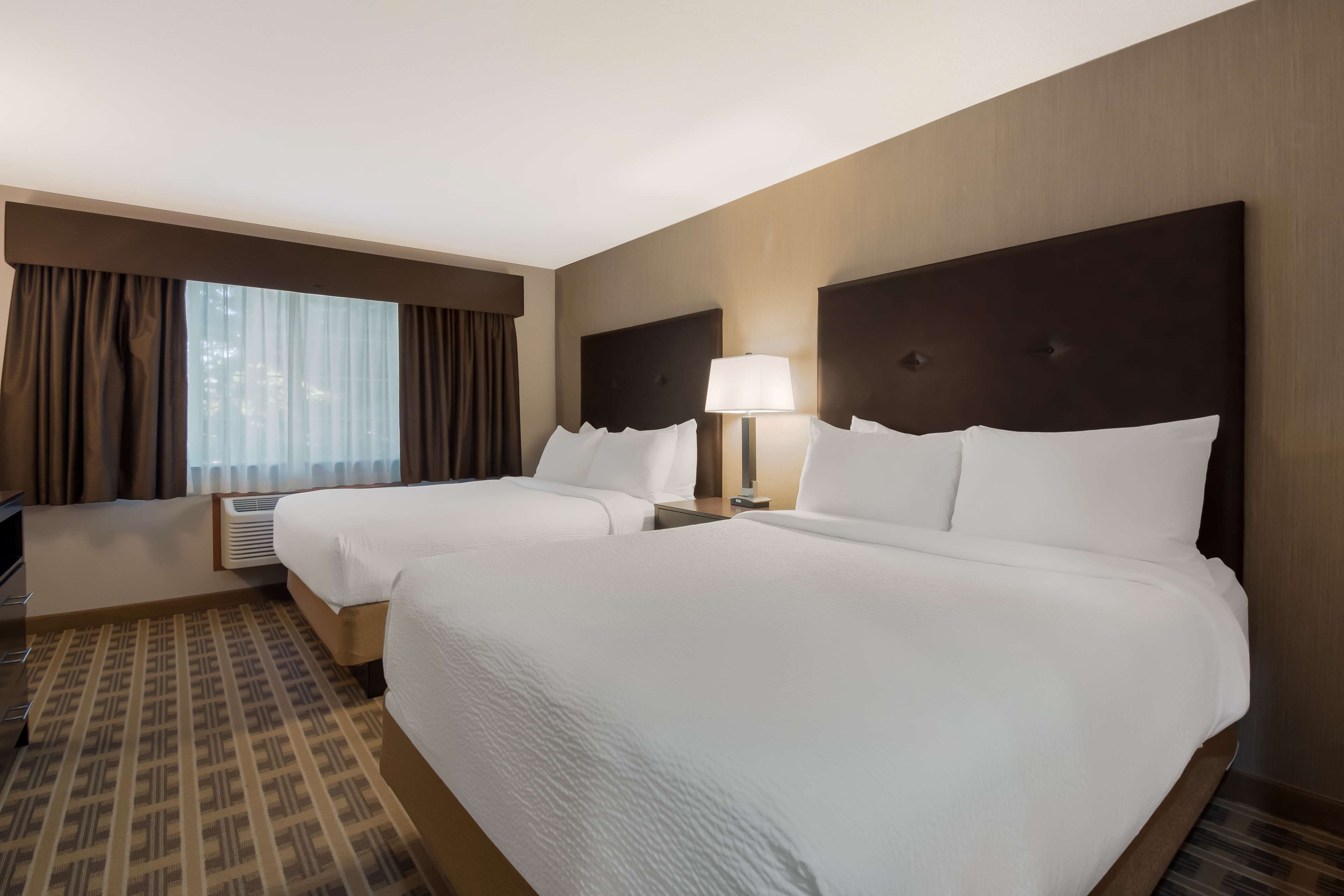 suite, 2 queen beds, non smoking, refrigerator & microwave (2nd floor;with single sofabed) | 1 bedroom, desk, laptop workspace, iron/ironing board