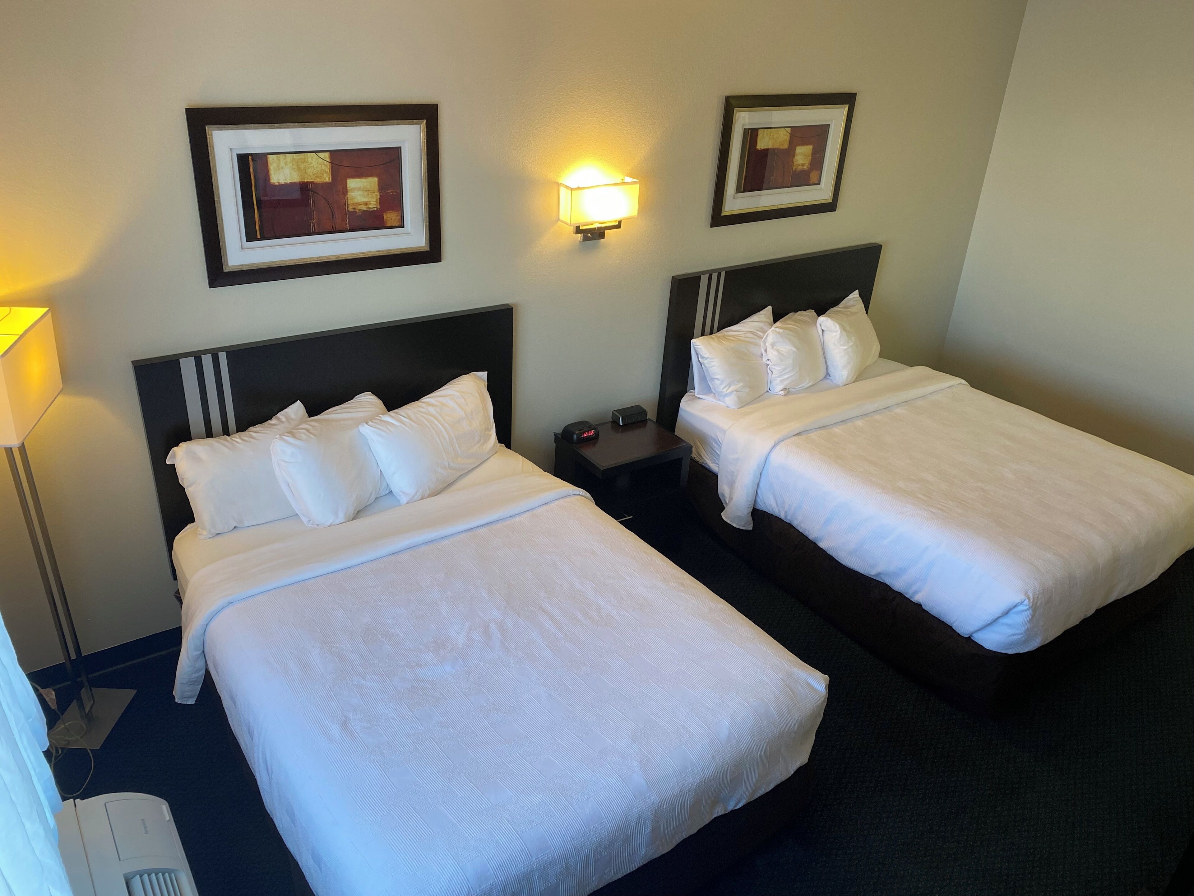 deluxe room, 2 queen beds, non smoking | desk, free wifi, bed sheets, alarm clocks