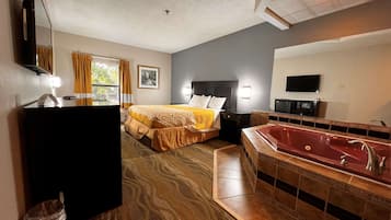 Suite, 1 King Bed, Non Smoking, Jetted Tub | Desk, laptop workspace, iron/ironing board, rollaway beds