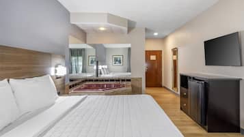 Suite, 1 King Bed, Non Smoking, Jetted Tub | Desk, laptop workspace, iron/ironing board, rollaway beds