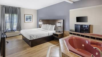 Suite, 1 King Bed, Non Smoking, Jetted Tub | Desk, laptop workspace, iron/ironing board, rollaway beds