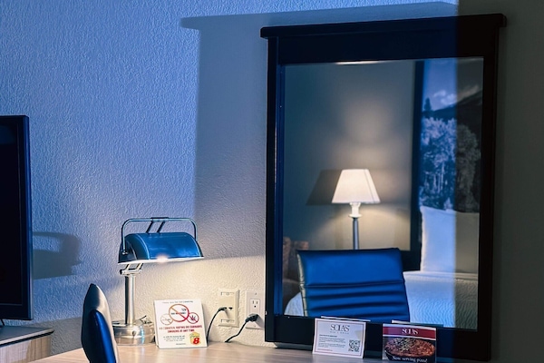 Hypo-allergenic bedding, pillow-top beds, desk, blackout curtains