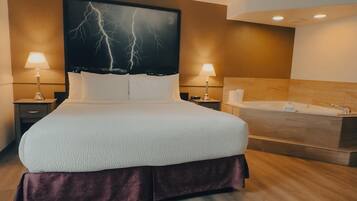 Room, 1 King Bed, Hot Tub | Hypo-allergenic bedding, pillowtop beds, desk, blackout drapes