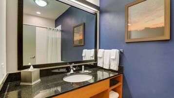 Designer toiletries, hair dryer, towels, soap