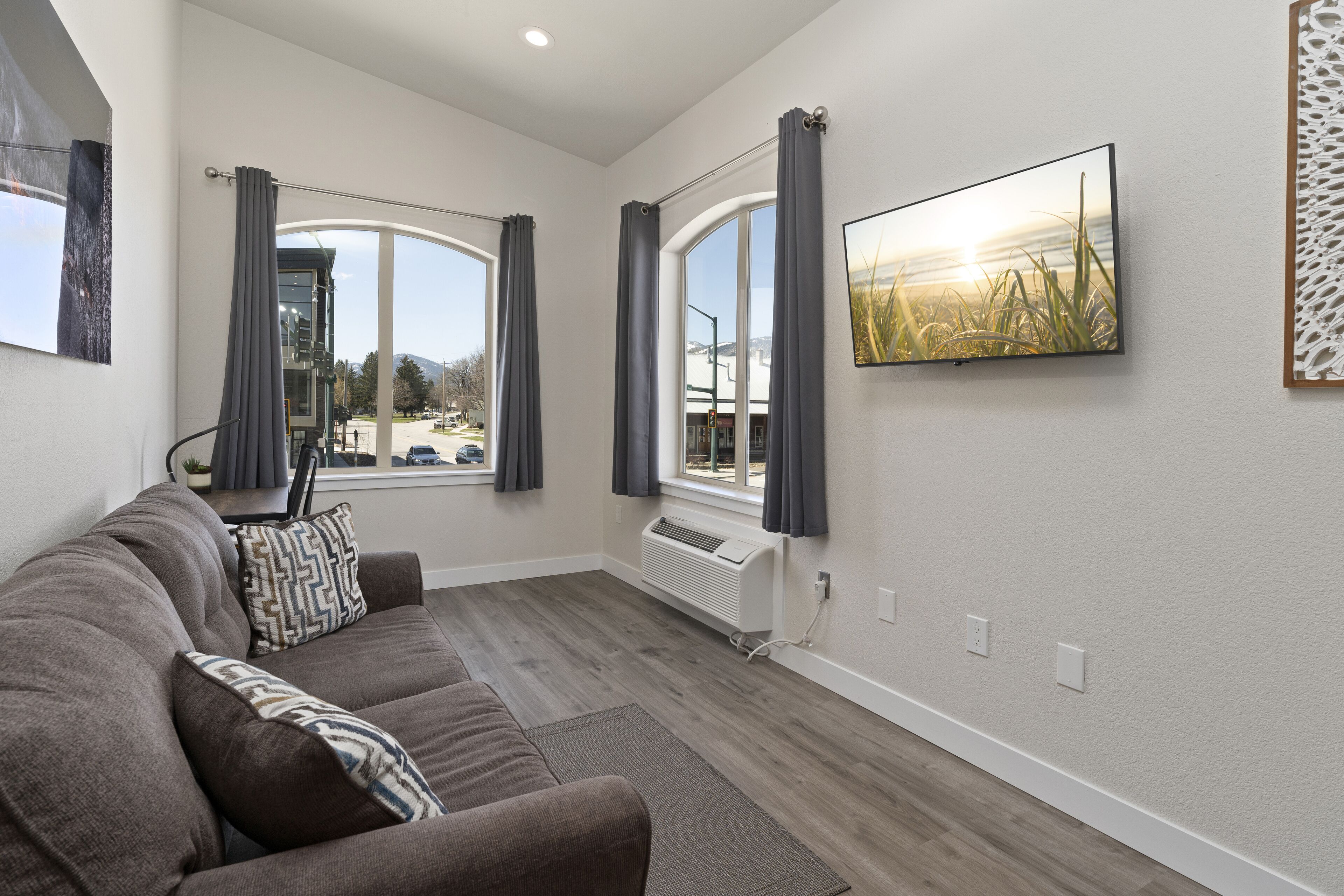 schweitzer suite | living area | 65-inch flat-screen tv with cable channels