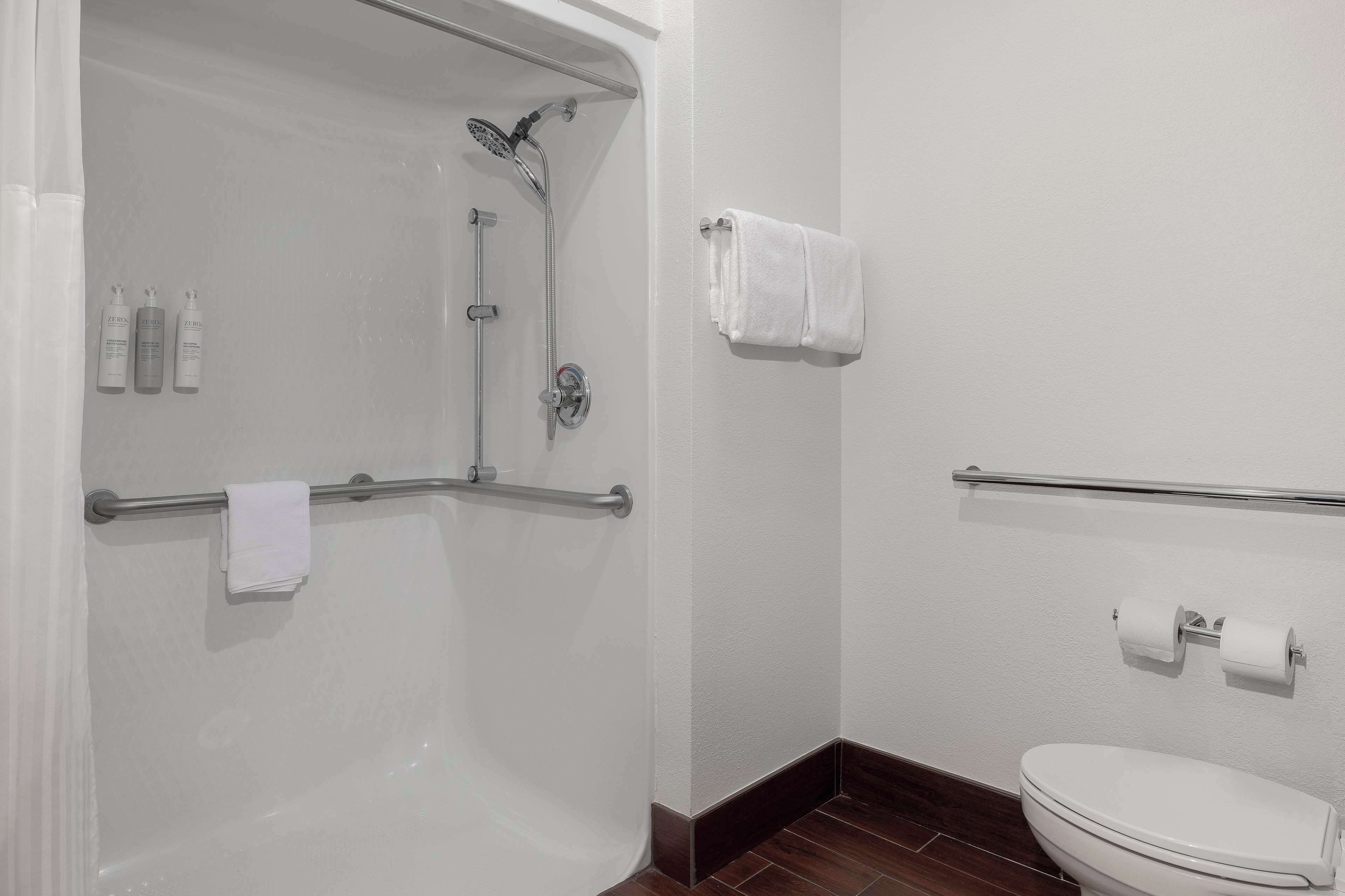 combined shower/bathtub, free toiletries, hair dryer, towels