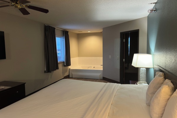Premium bedding, desk, blackout drapes, soundproofing