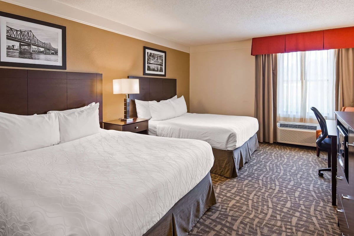 Premium bedding, desk, laptop workspace, iron/ironing board