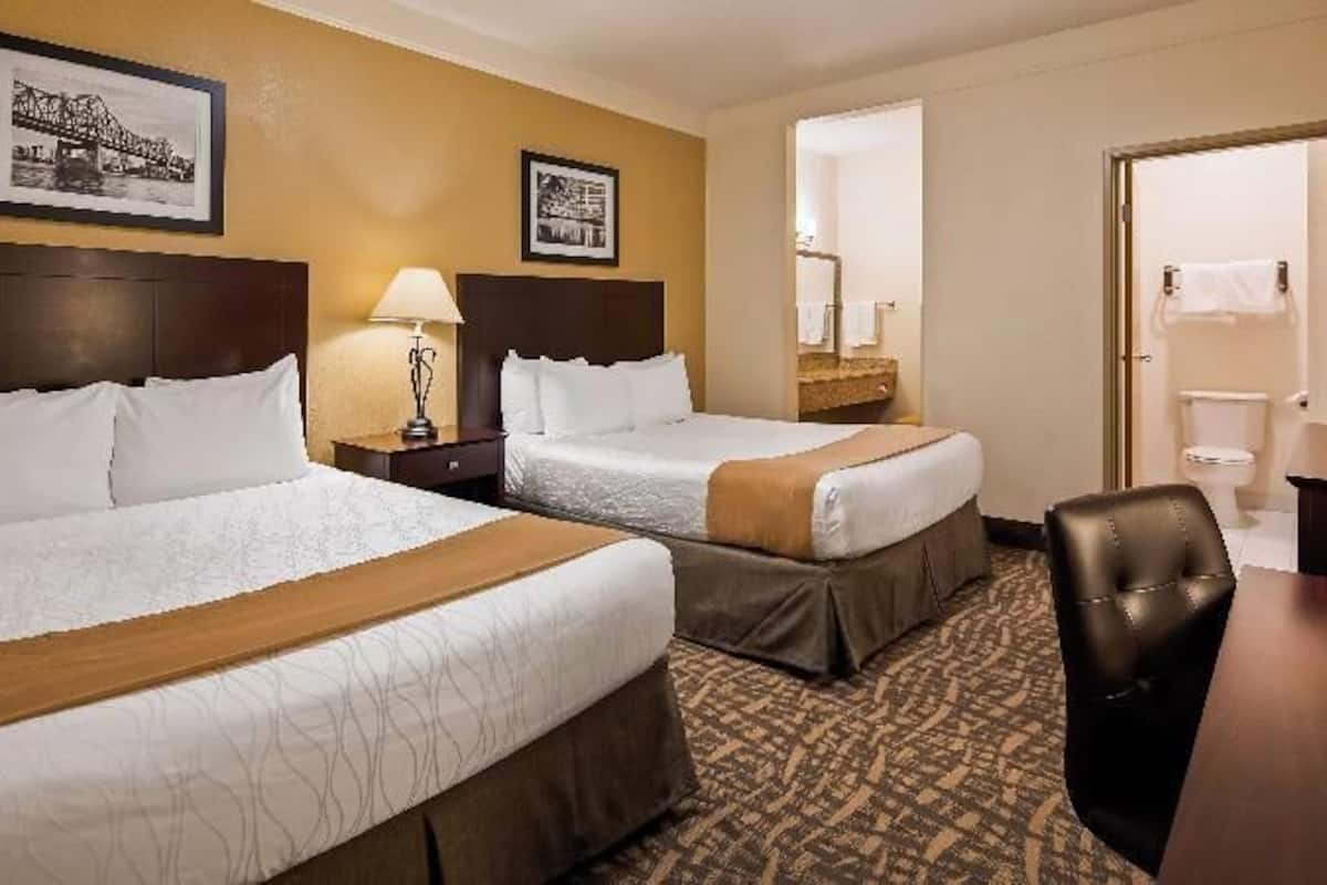 Premium bedding, desk, laptop workspace, iron/ironing board