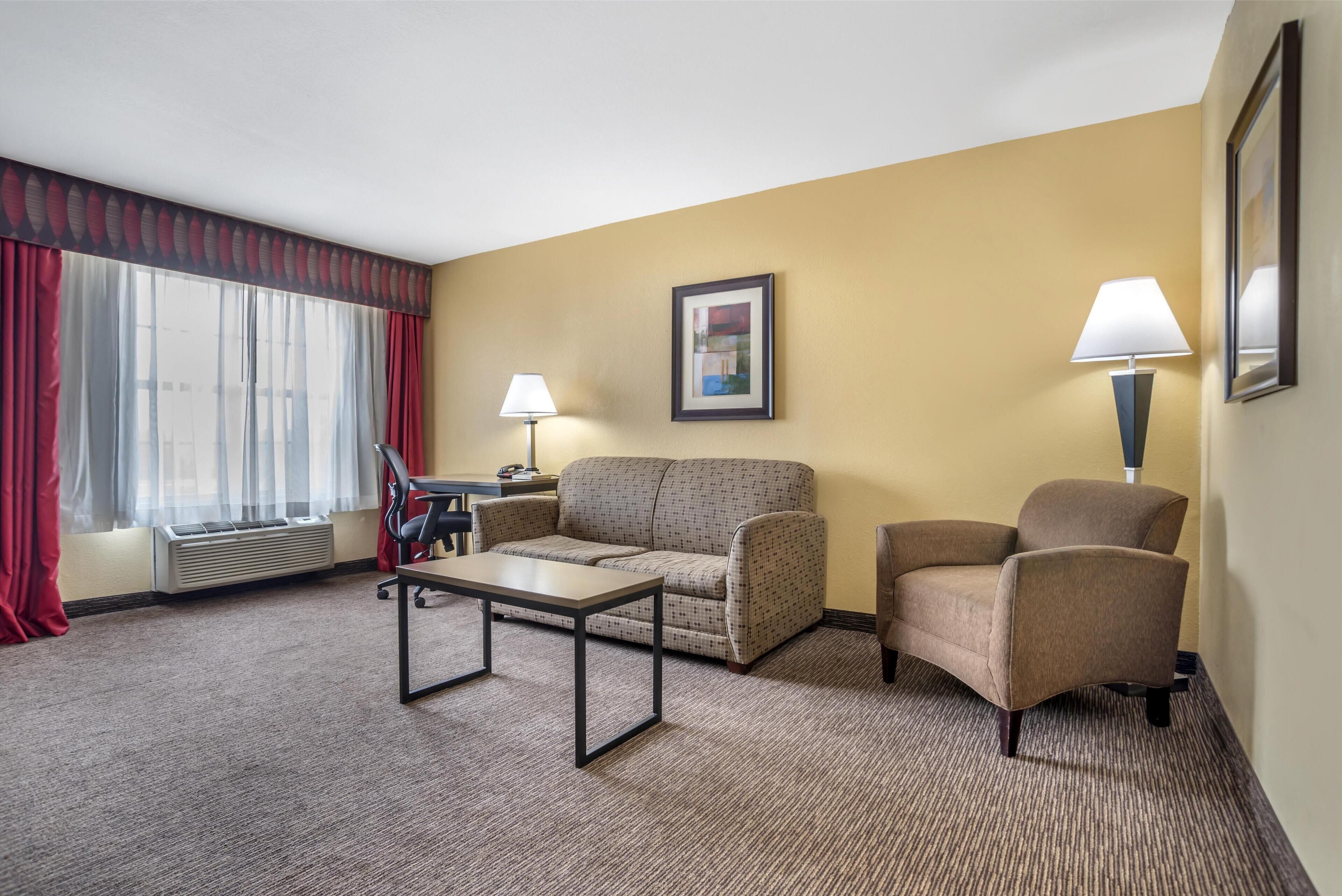 suite, 1 king bed, non smoking, kitchenette (with sofabed) | desk, laptop workspace, iron/ironing board, free cots/infant beds