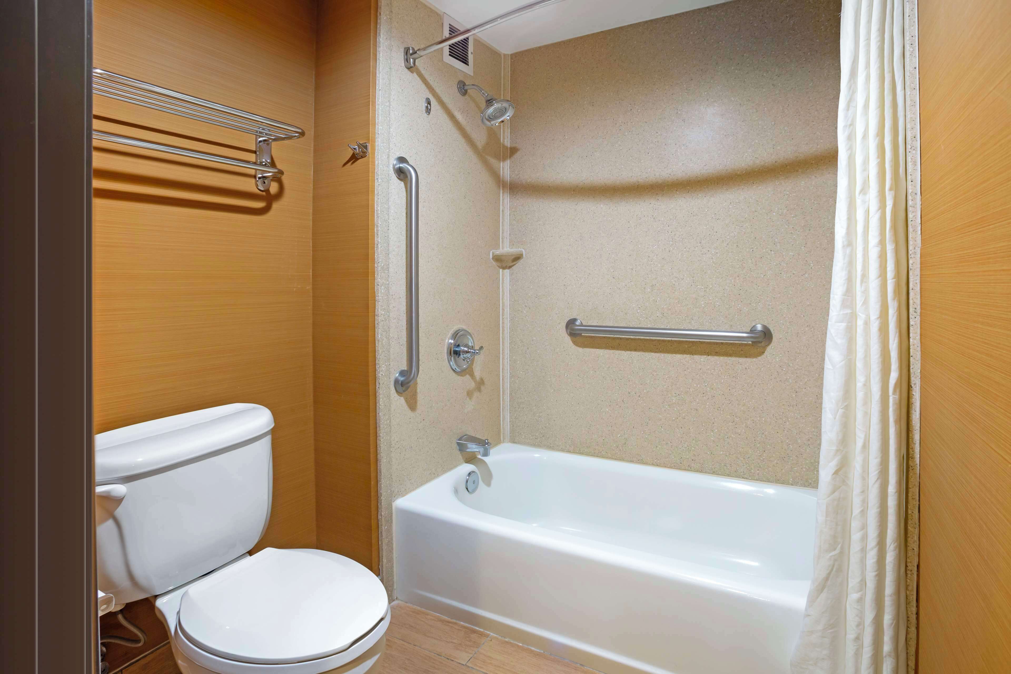 standard room, 2 queen beds, non smoking, refrigerator & microwave | bathroom | shower, free toiletries, hair dryer, towels