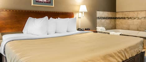 Standard Room, 1 King Bed, Non Smoking, Jetted Tub | Iron/ironing board, free cribs/infant beds, rollaway beds, free WiFi