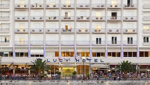 A hotel with multiple balconies and a waterfront view. - Lucy Hotel (Chalcis)