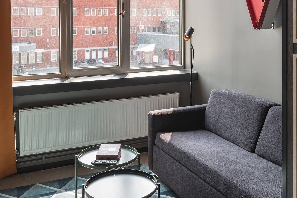 hypo-allergenic bedding, desk, blackout curtains, soundproofing