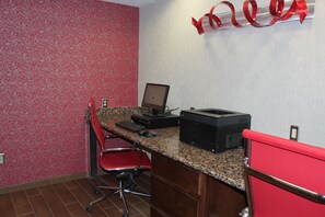 A small office space with a desktop computer, printer, and red office chair. - Holiday Inn Express Rocklin - Galleria Area by IHG (Rocklin)