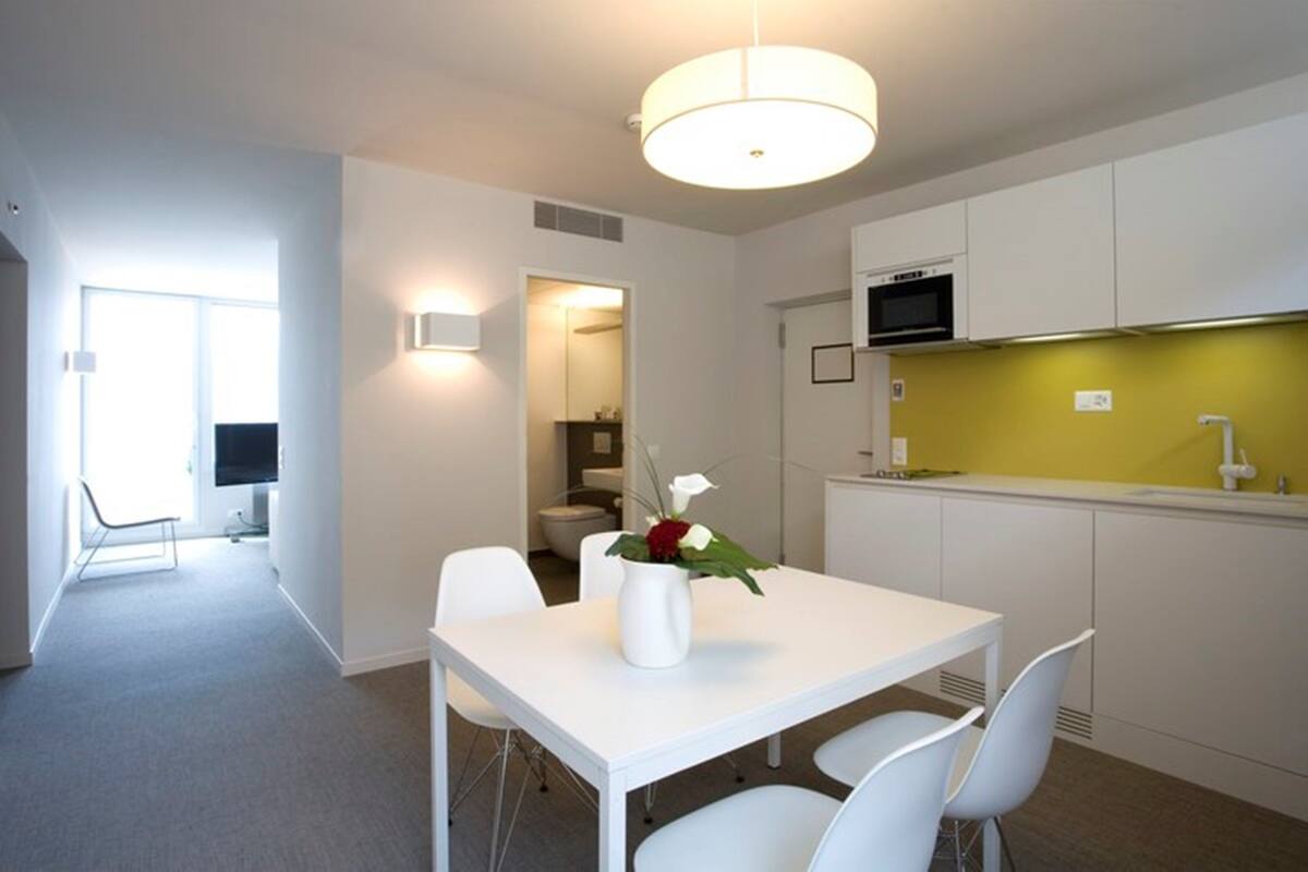 apartment, 2 bedrooms, lake view | 1 bedroom, minibar, in-room safe, desk