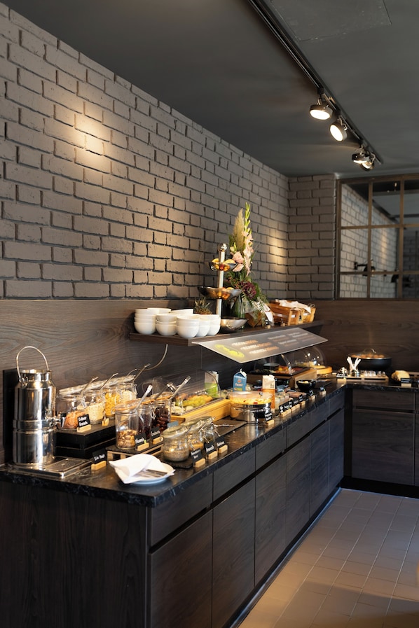 Enjoy a sumptuous breakfast spread with a variety of food and beverages.