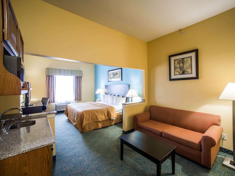 Desk, laptop workspace, blackout curtains, iron/ironing board