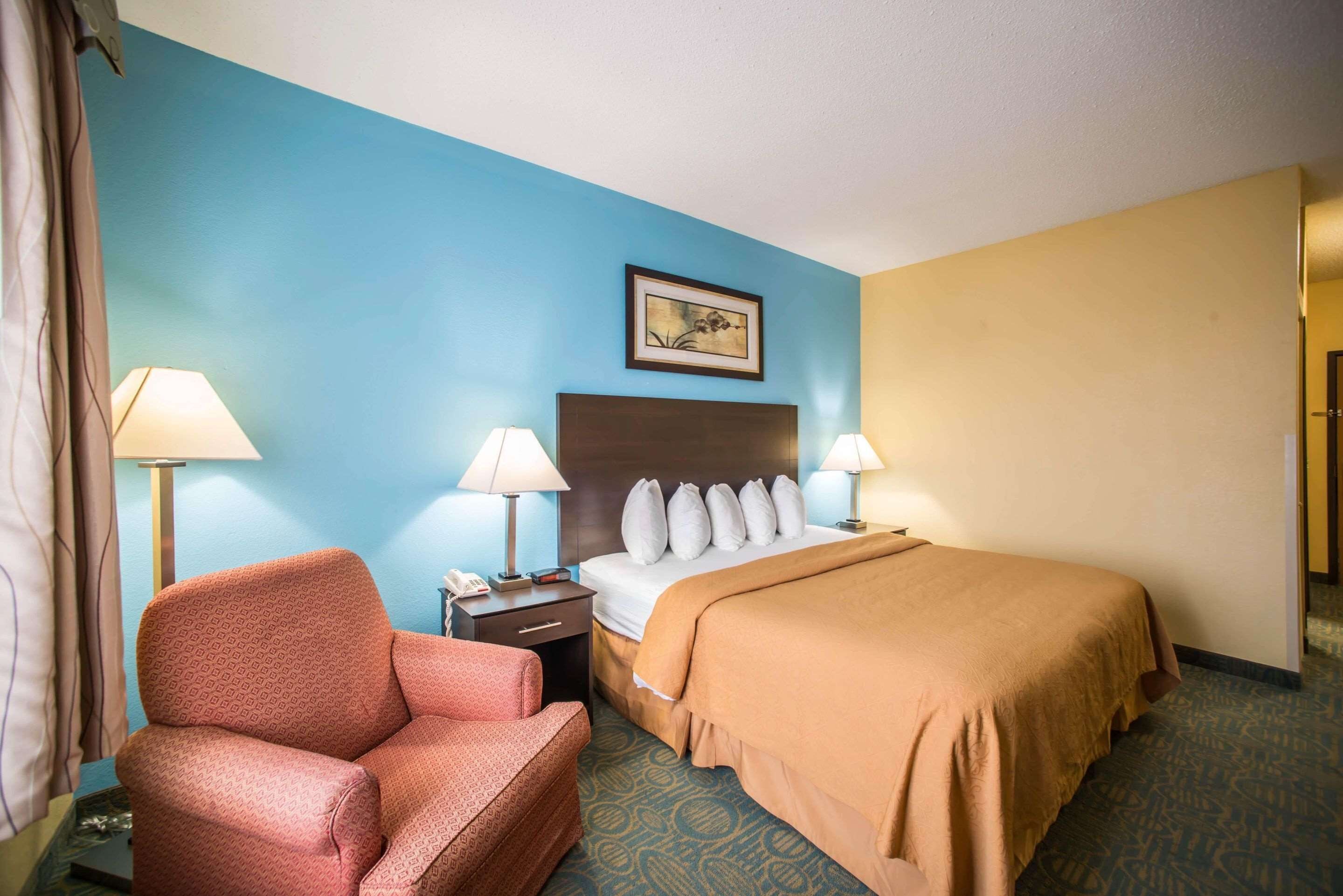 desk, laptop workspace, blackout curtains, iron/ironing board