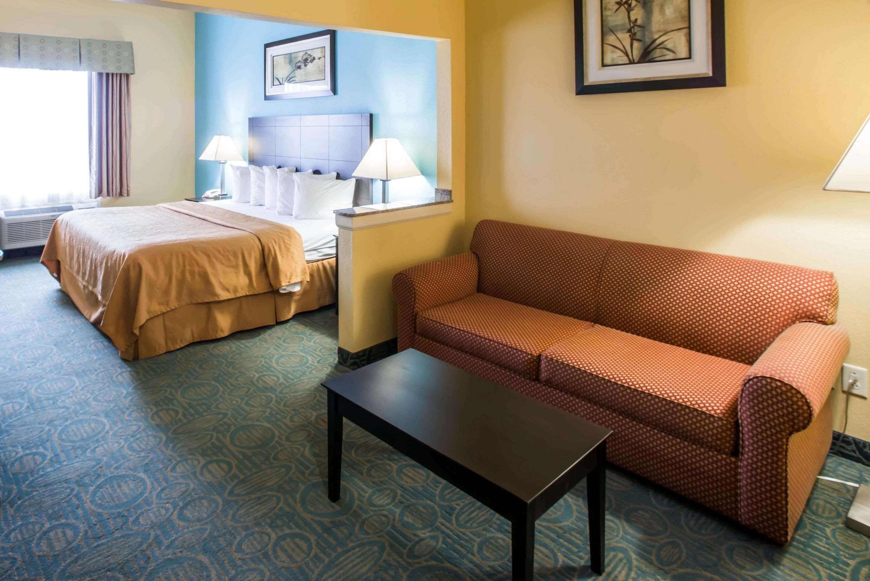 desk, laptop workspace, blackout curtains, iron/ironing board