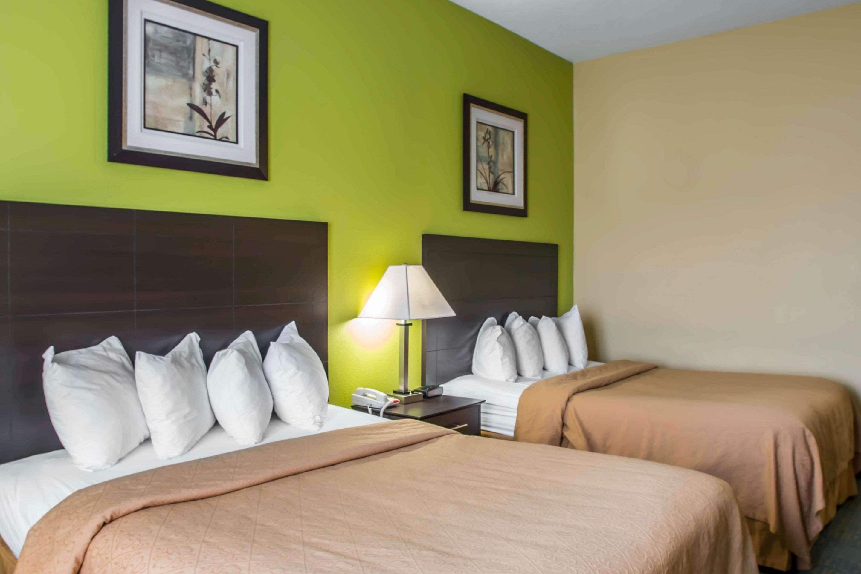 desk, laptop workspace, blackout curtains, iron/ironing board