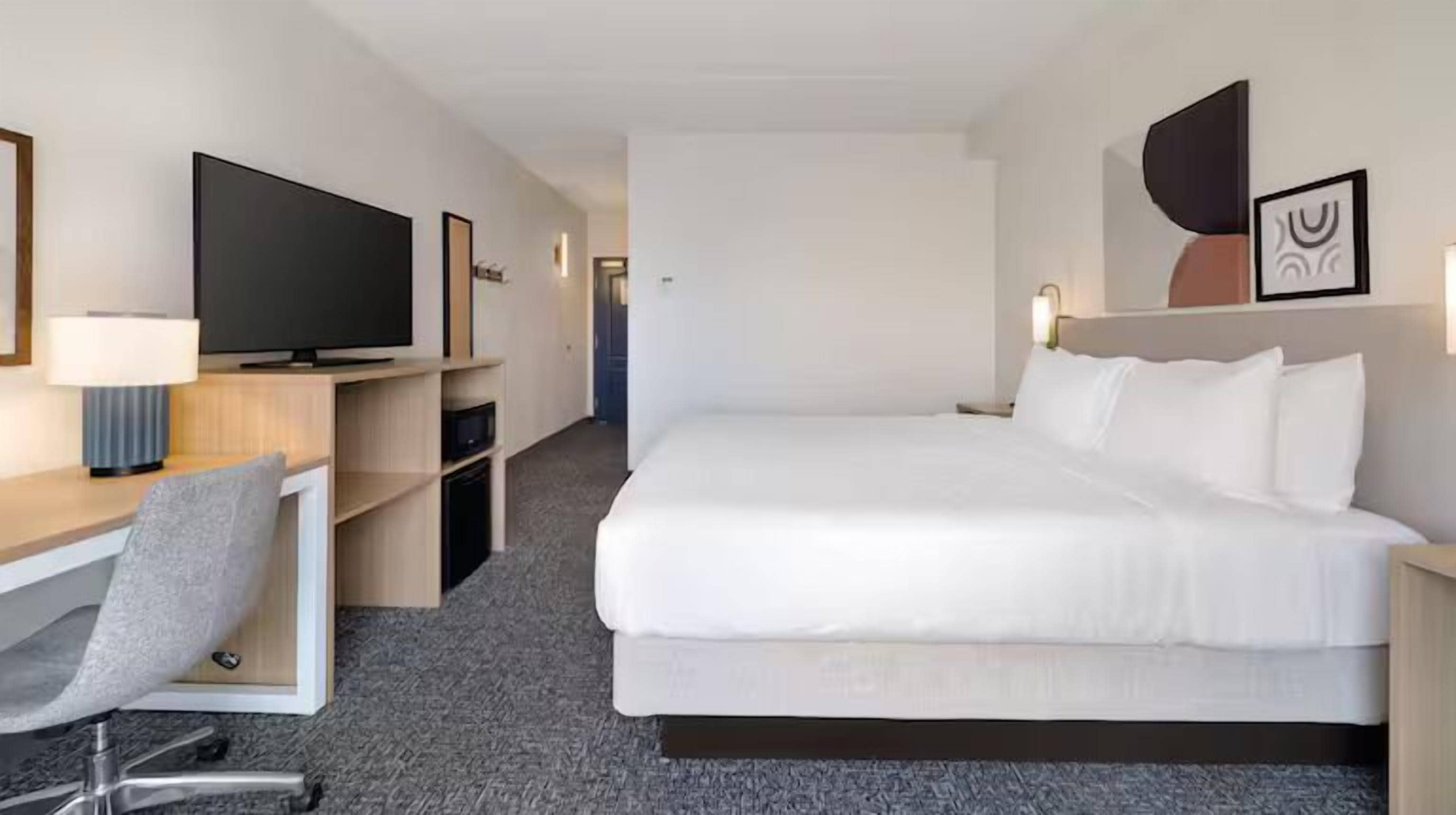 Room, 1 King Bed | Desk, blackout drapes, iron/ironing board (on request), cribs (free)