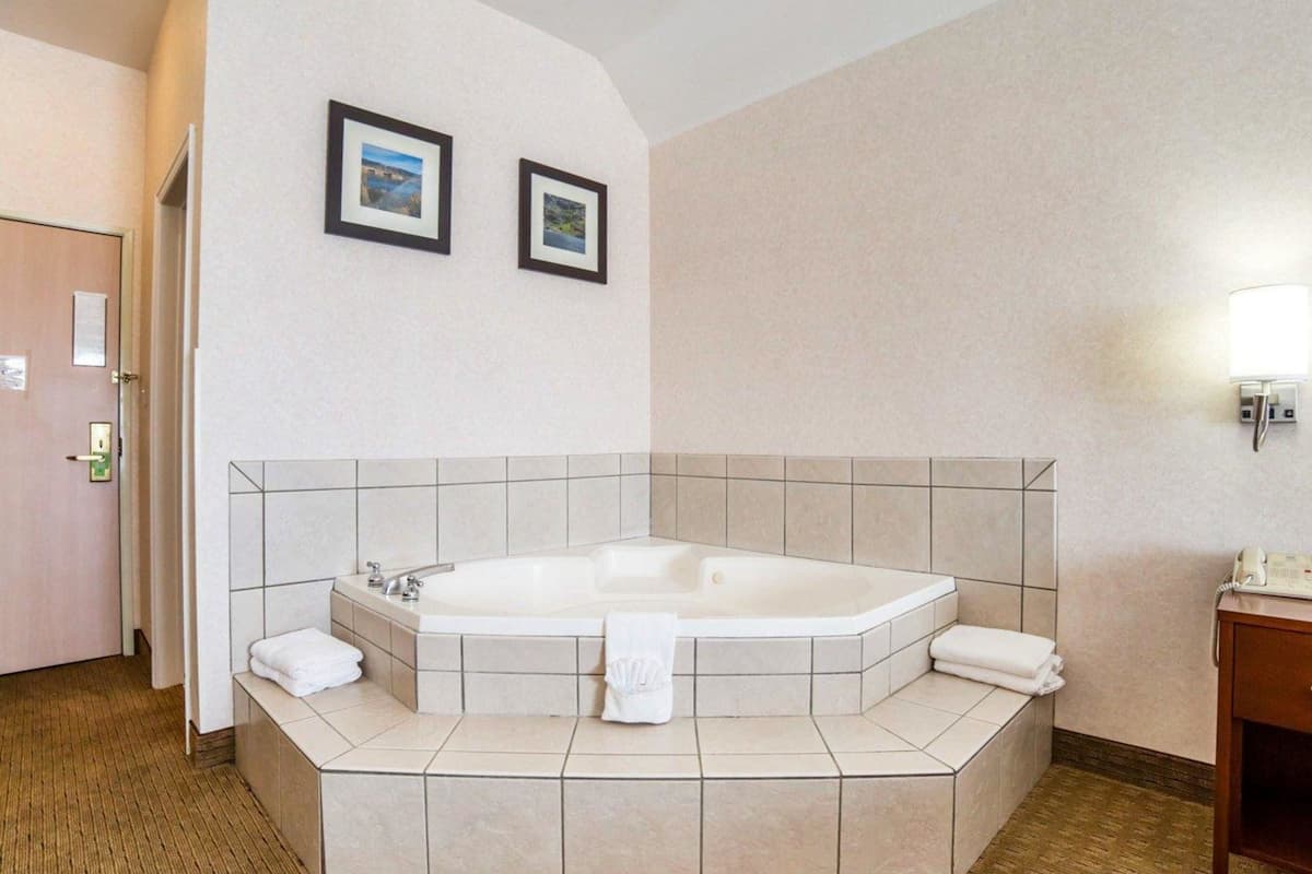 premium bedding, desk, laptop workspace, iron/ironing board