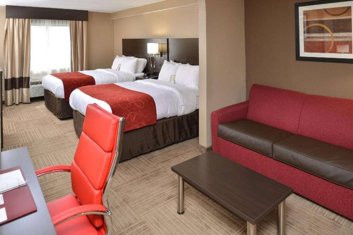 Desk, laptop workspace, blackout drapes, iron/ironing board