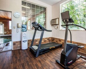 Stay active with our fitness area, featuring two treadmills and a water dispenser.