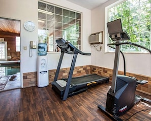Stay active with our fitness area, featuring two treadmills and a water dispenser.