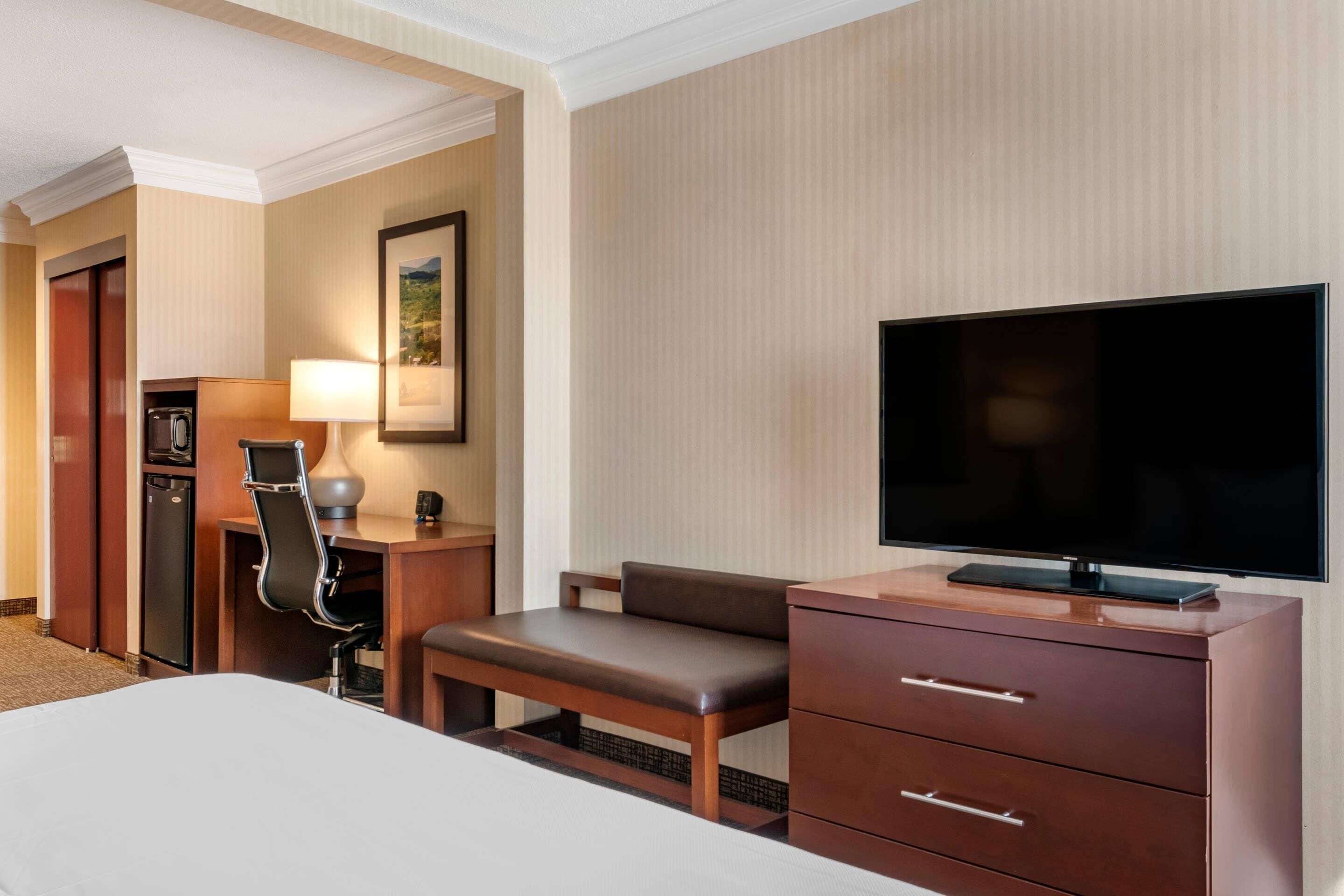 Suite, 1 King Bed, Non Smoking | Desk, laptop workspace, iron/ironing board, free cribs/infant beds