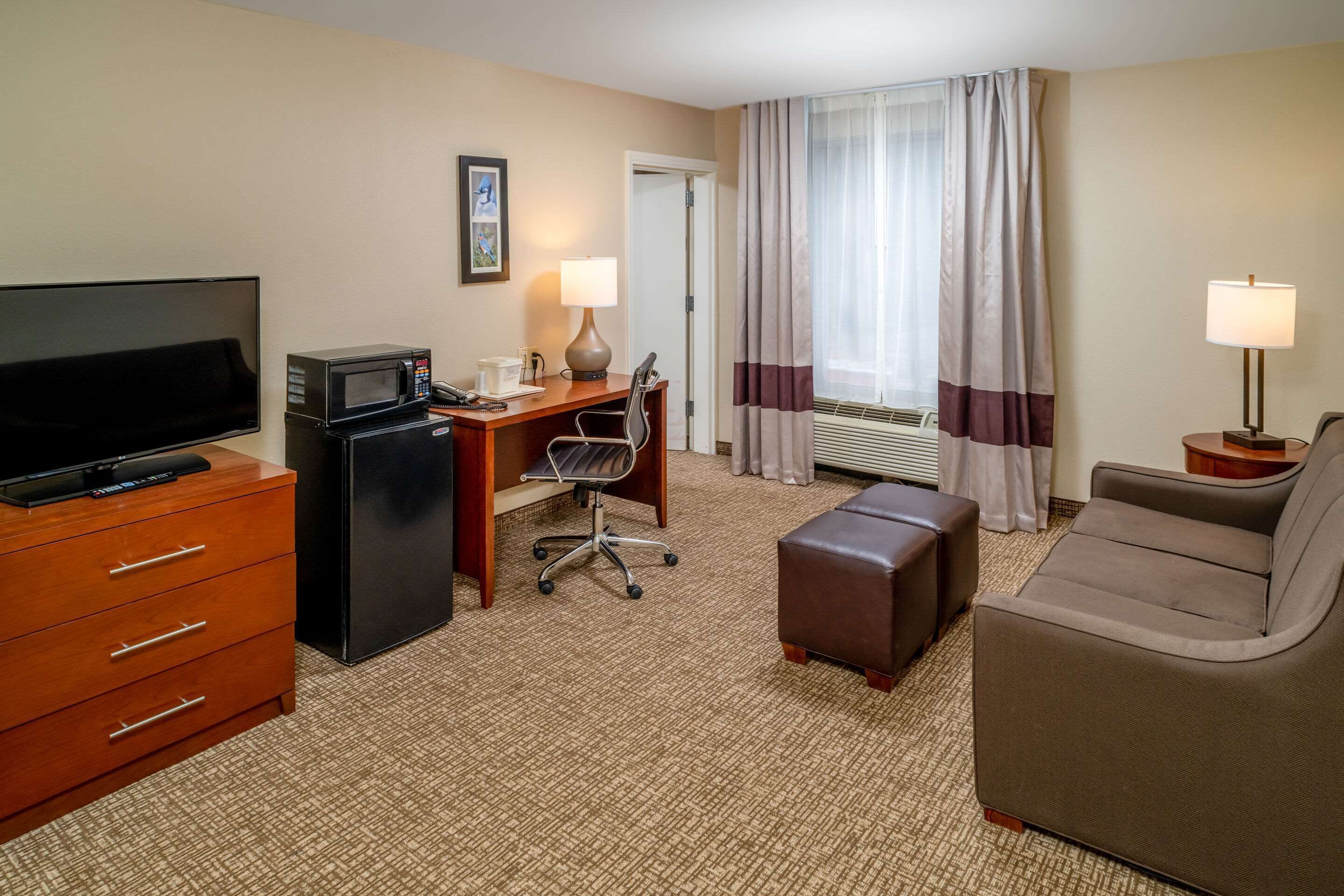 suite, multiple beds, accessible, non smoking | in-room safe, desk, laptop workspace, iron/ironing board