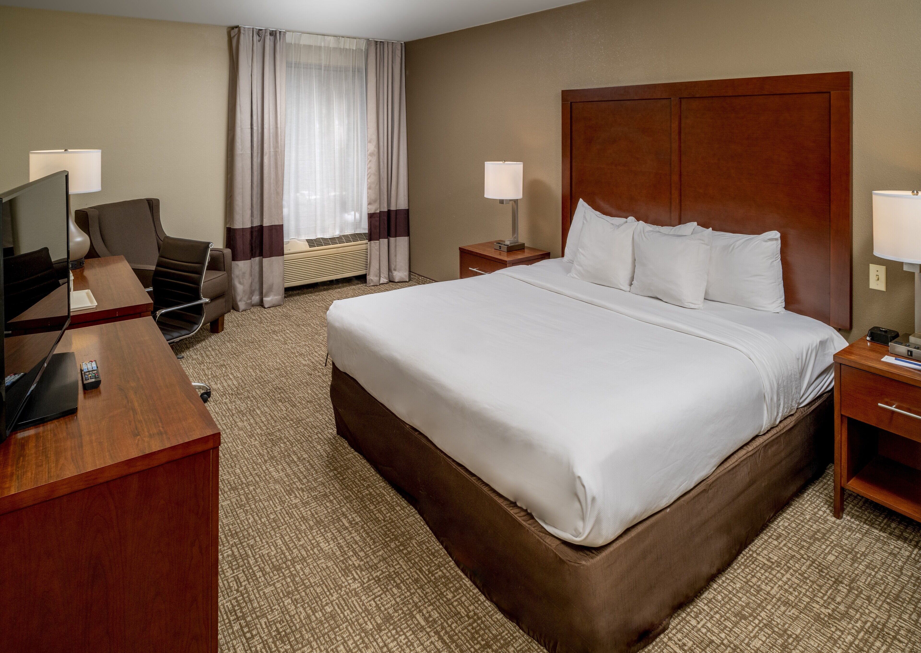 suite, 1 king bed, non smoking | in-room safe, desk, laptop workspace, iron/ironing board