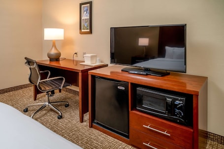 In-room safe, desk, laptop workspace, iron/ironing board. Comfort Inn & Suites Grundy