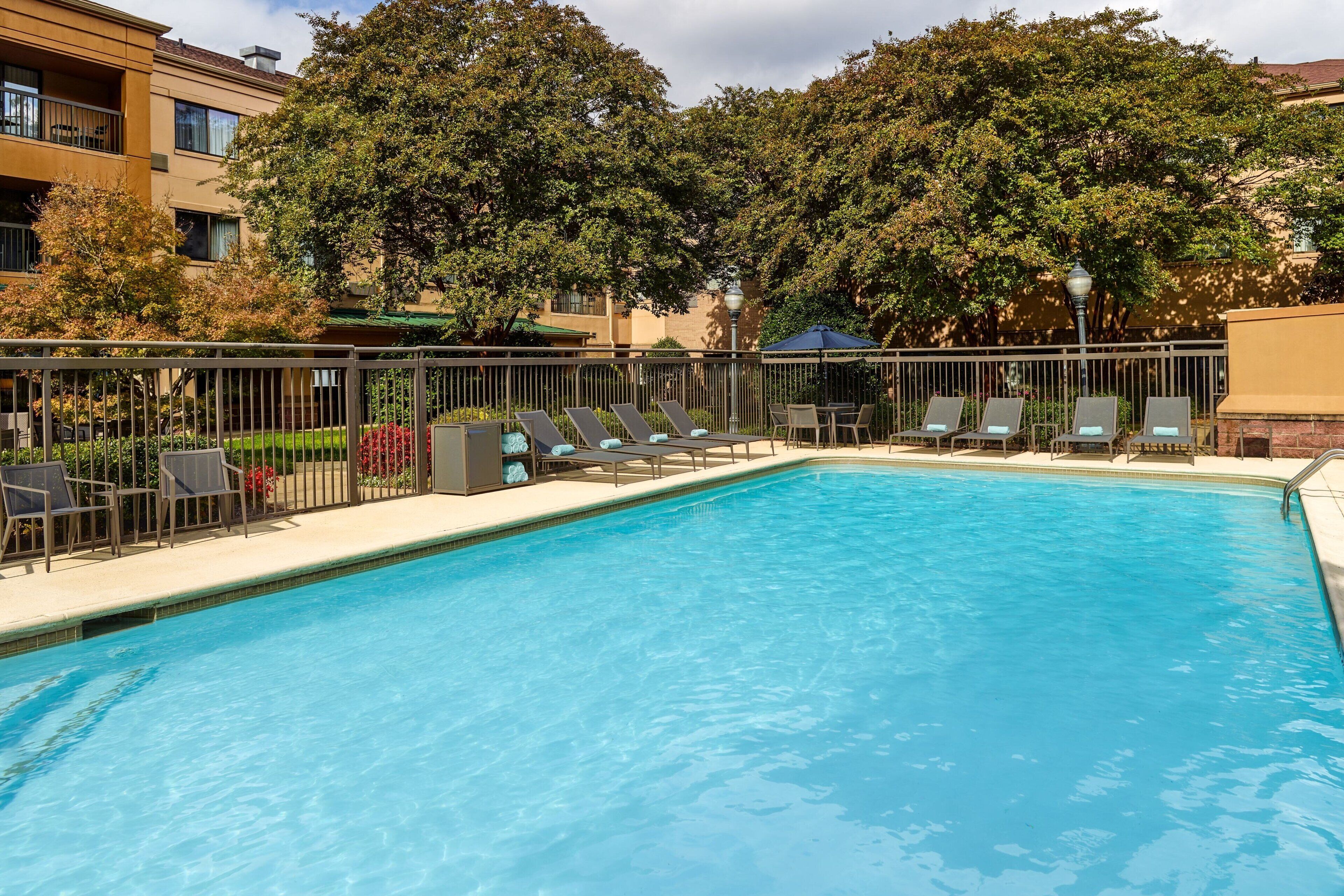 seasonal outdoor pool, open 9:00 am to 9:00 pm, pool loungers