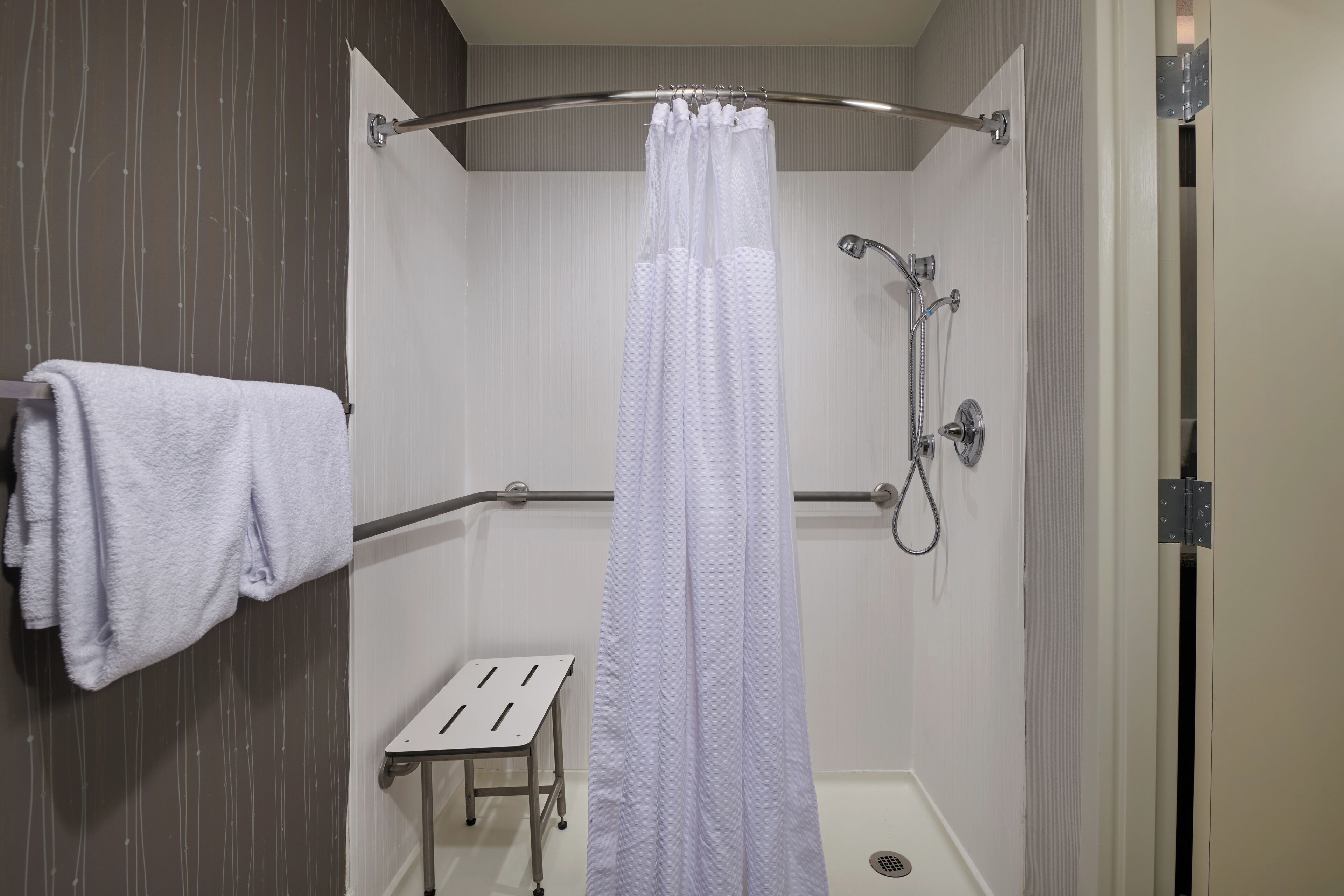 room, 1 king bed, non smoking (mobility/hearing access, roll-in shwr) | 1 bedroom, desk, laptop workspace, blackout curtains