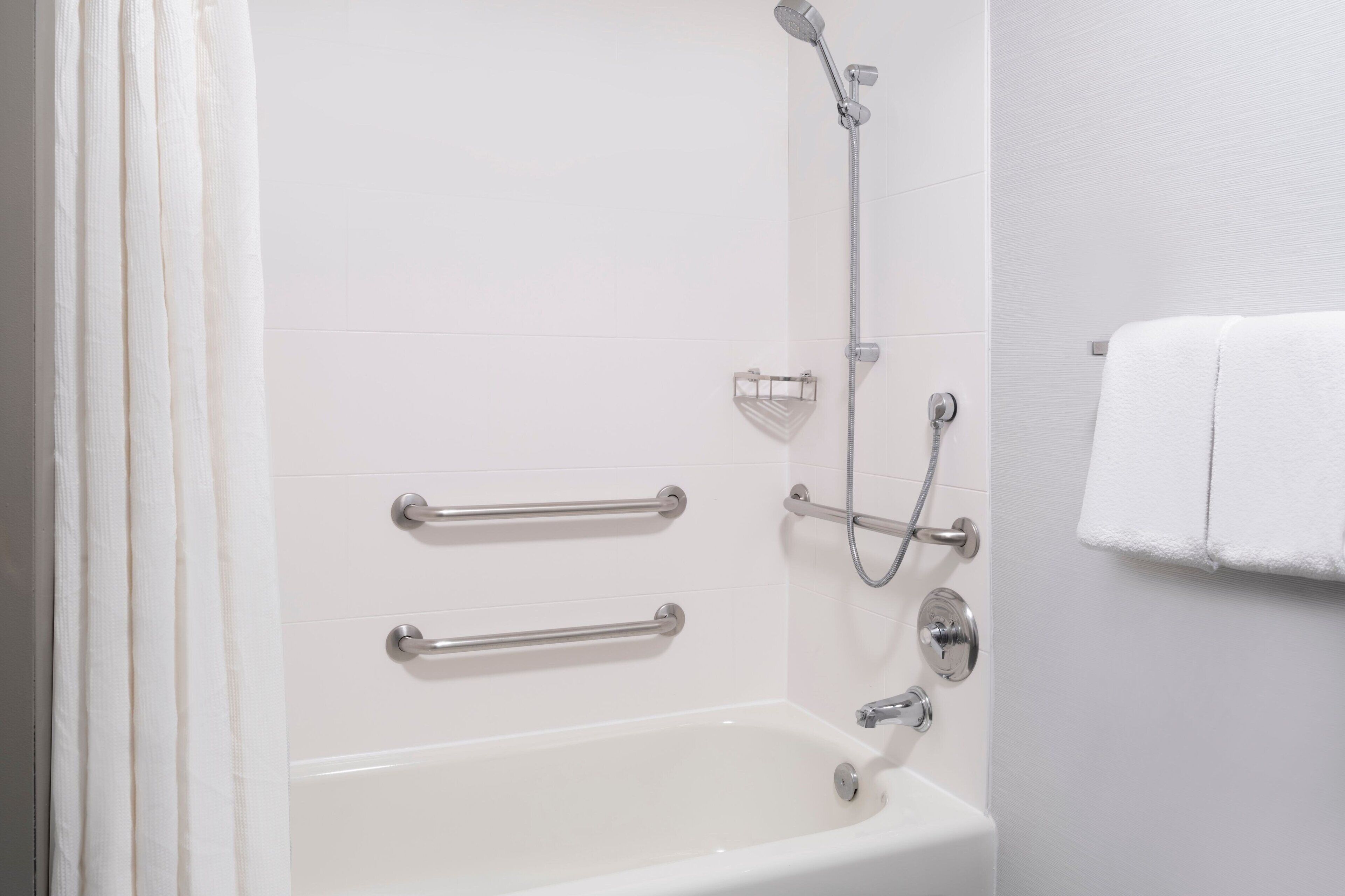 combined shower/bathtub, free toiletries, hair dryer, towels