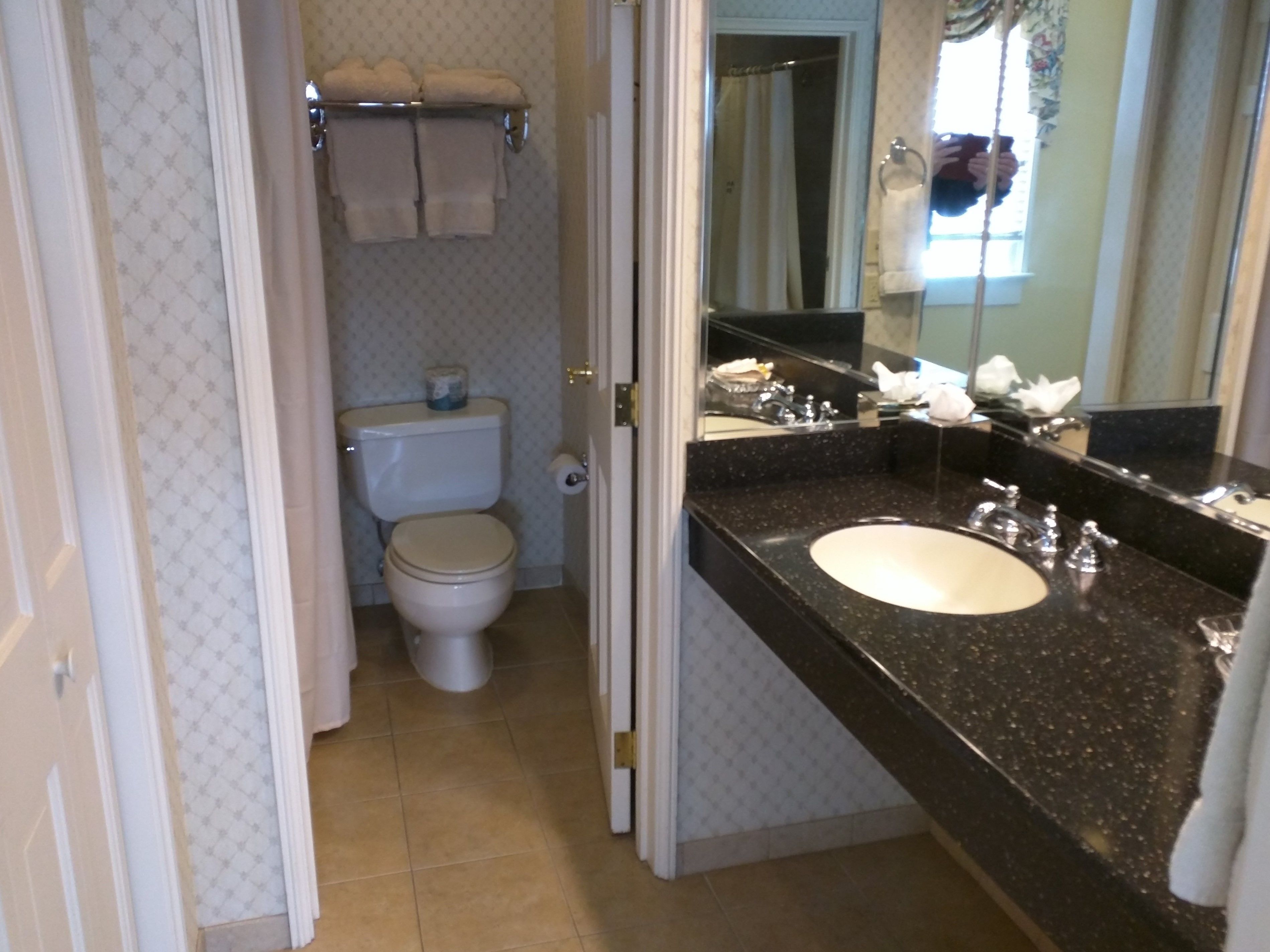 combined shower/bathtub, designer toiletries, hair dryer, dressing gowns