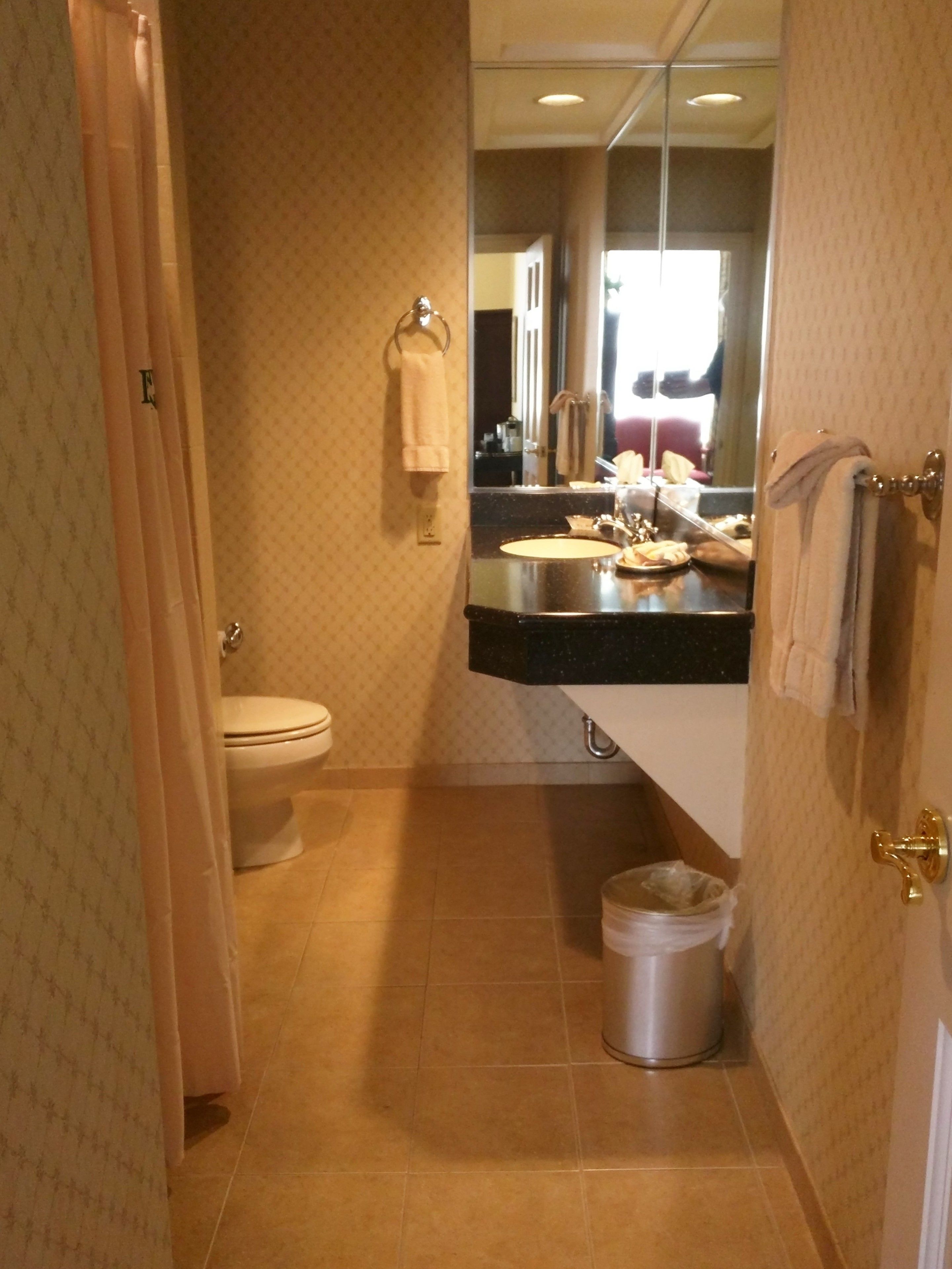 combined shower/bathtub, designer toiletries, hair dryer, dressing gowns