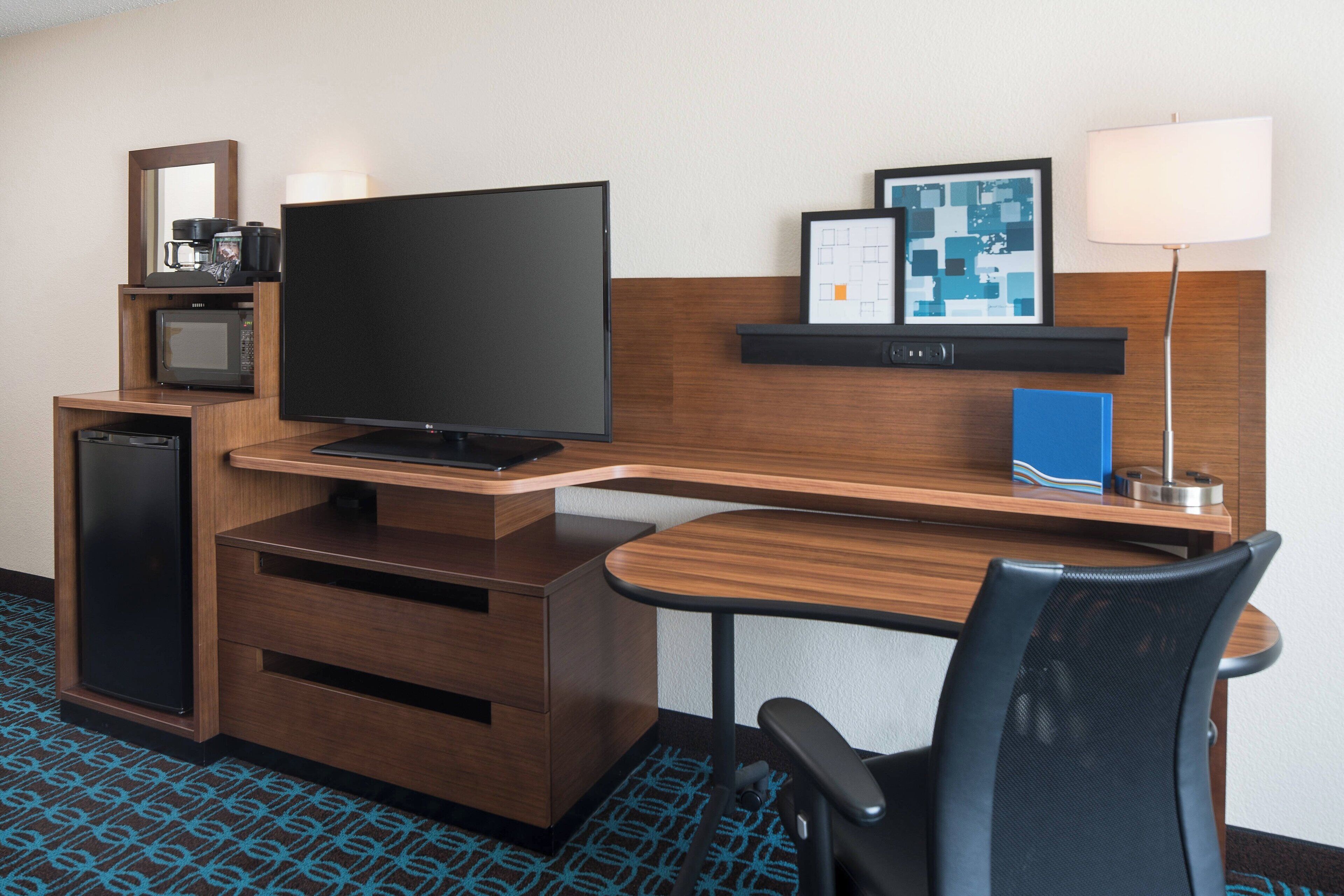 desk, blackout curtains, iron/ironing board, free cots/infant beds