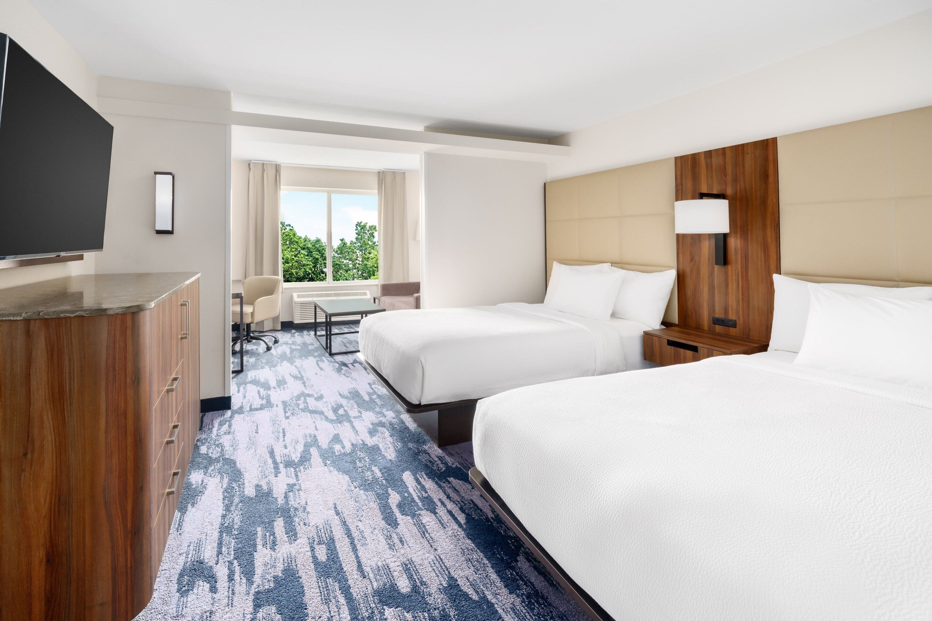 hypo-allergenic bedding, desk, blackout curtains, iron/ironing board