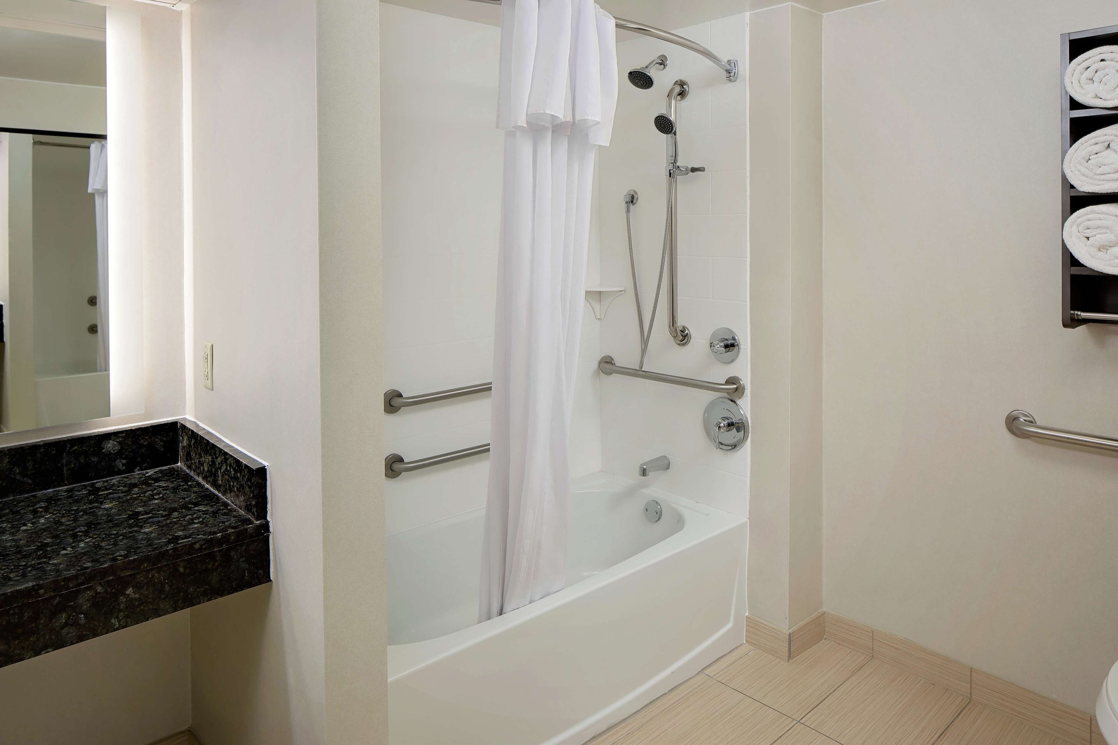 combined shower/bathtub, free toiletries, hair dryer, towels